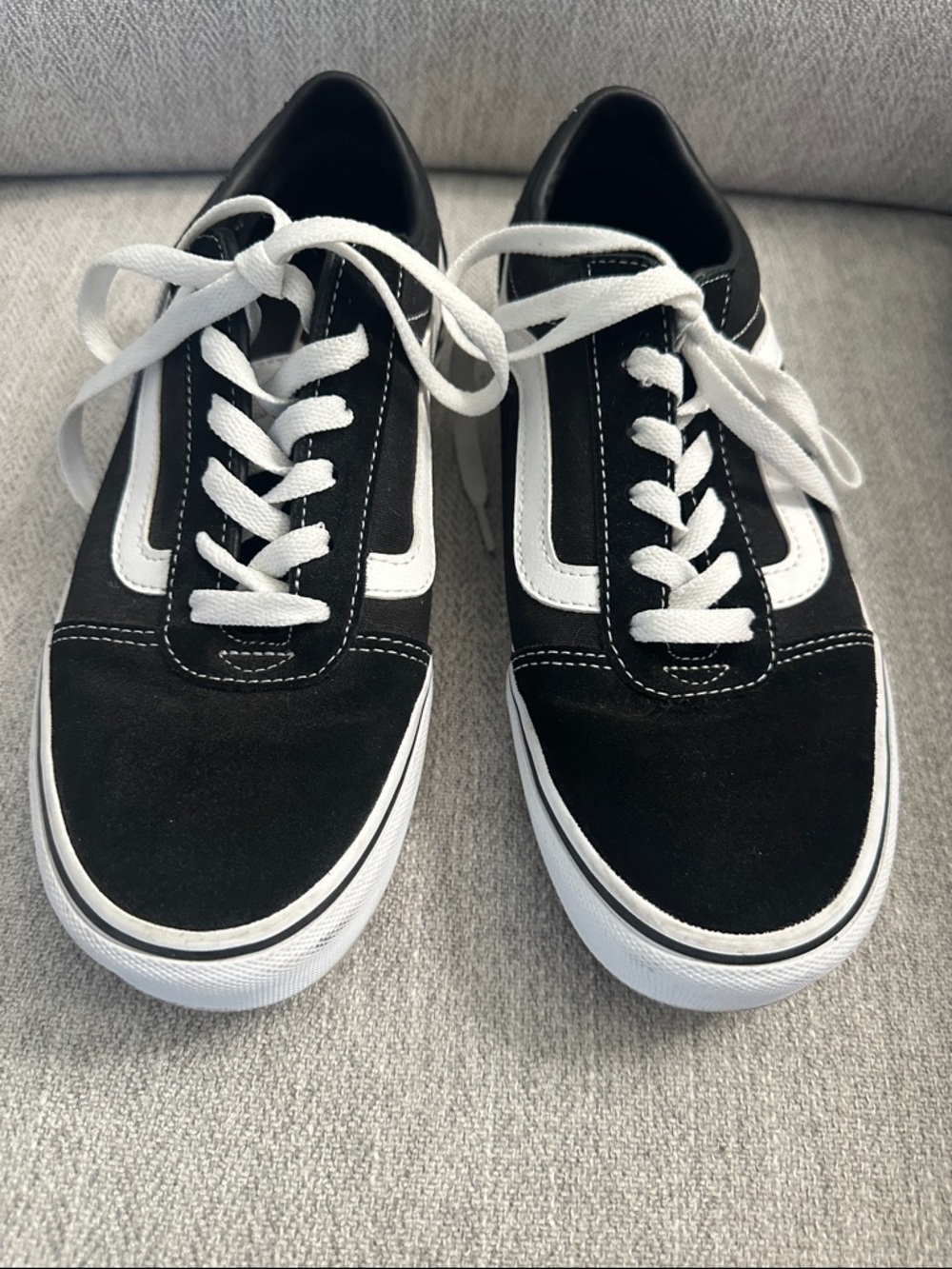 Vans Black and White Old Skool Low-Top Sneakers for women.